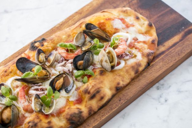 Fiume Roman style pizza with mussels and clams at Battersea power station